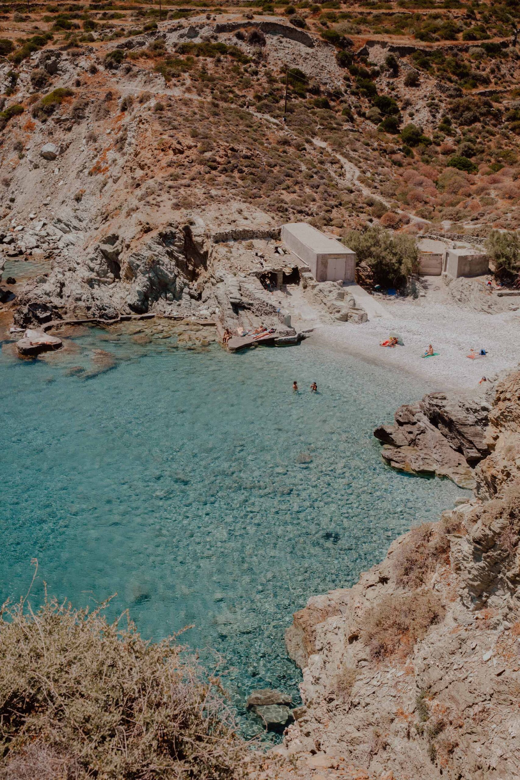 Secluded Galifos Beach Folegandros with pristine waters, rocky shoreline and natural swimming cove