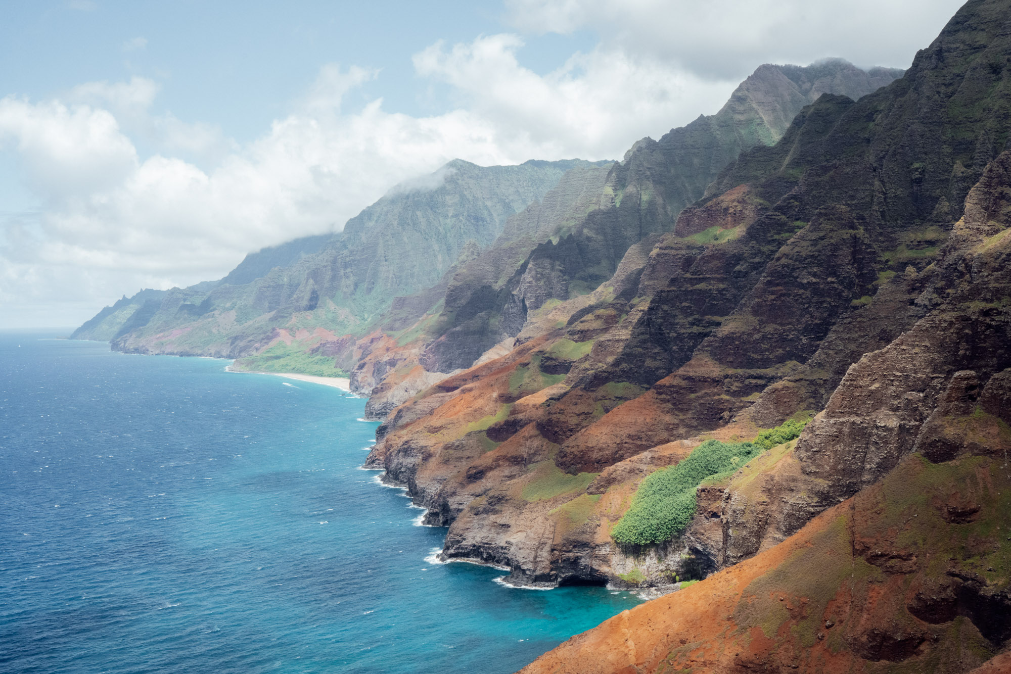 Na Pali Coastline mountains from a helicopter in Kauai