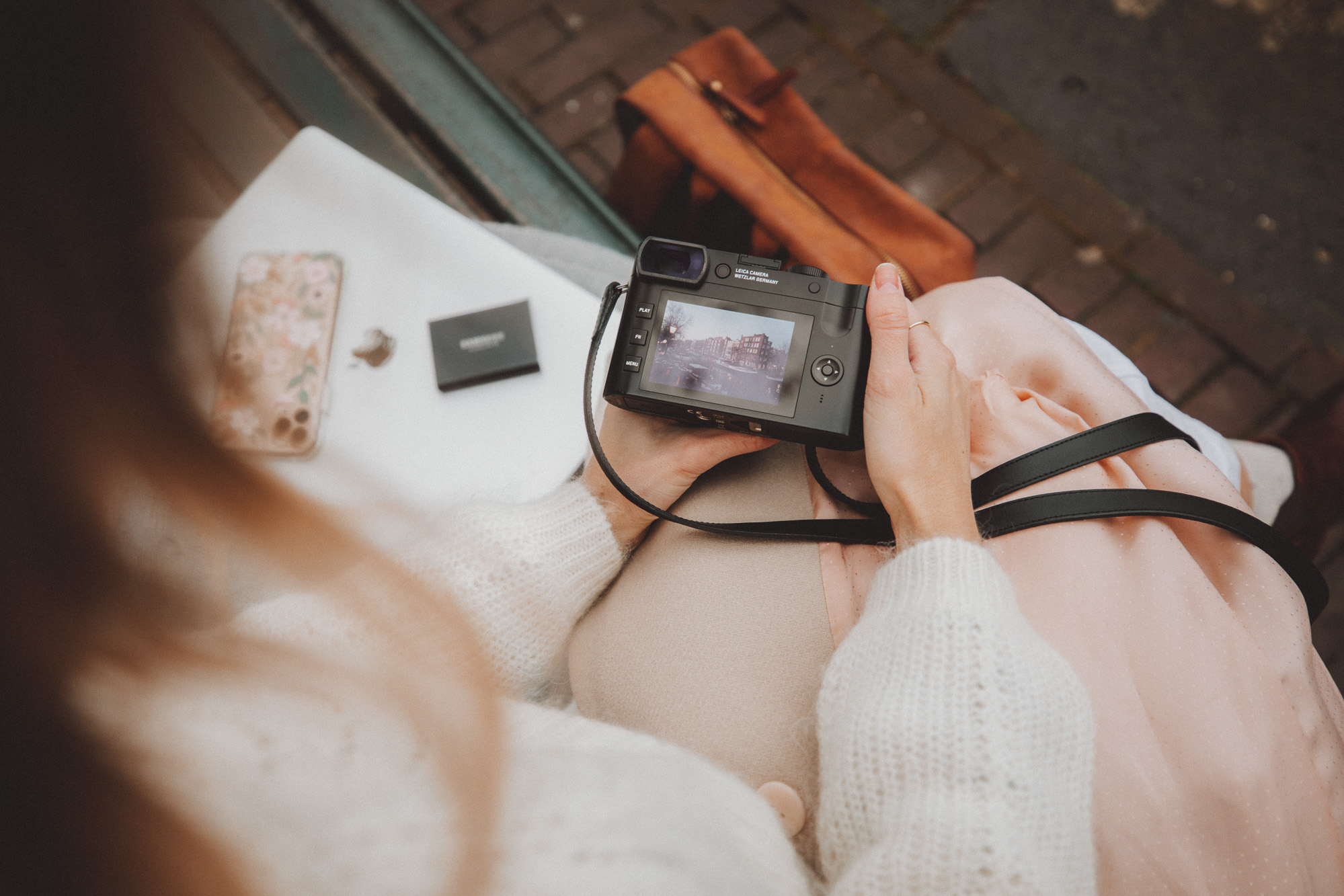 Hard drives and camera used for photo organization process